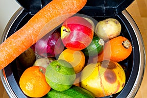 Bin full of fruit and vegetables