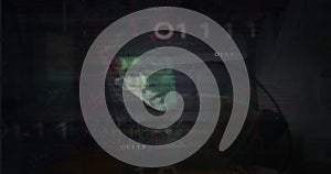 Binary code and circuit image over person working on computer