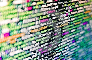 Binary computer code background, abstract. Shallow Depth of Field effect. Digital technology on display. Abstract software
