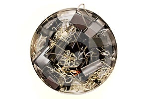 Binder clips in a round box photo