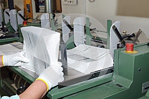 Binding of books in printing house