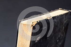 binding of an old book in black cover