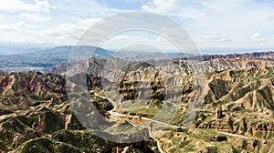 Binggou Danxia Canyon Landform. Road Valley in the Geopark