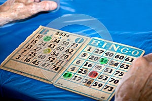 Bingo Cards Close-Up with Hands