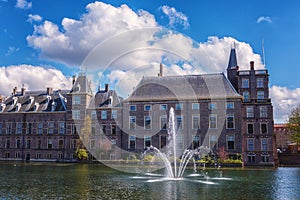 Binnenhof castle Dutch Parliament background with the Hofvijver lake, historical complex, Hague Den Haag, Netherlands