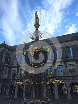 Binnenhof palace in Hague - A gold neogothic fountain