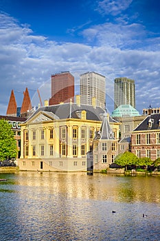 Binnenhof Palace of Parliament inThe Hague in The Netherlands At Daytime. Against Modern Skyscrapers