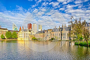 Binnenhof Palace of Parliament inThe Hague in The Netherlands At Daytime. Against Modern Skyscrapers on Background
