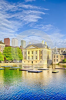 Binnenhof Palace of Parliament inThe Hague in The Netherlands At Daytime. Against Modern Skyscrapers on Background