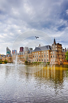 Binnenhof Palace of Parliament inThe Hague in The Netherlands At Daytime. Against Modern Skyscrapers on Background