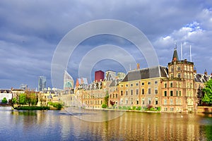 Binnenhof Palace of Parliament inThe Hague in The Netherlands At Daytime. Against Modern Skyscrapers on Background