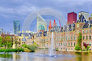 Binnenhof Palace of Parliament inThe Hague in The Netherlands At Daytime. Against Modern Skyscrapers on Background