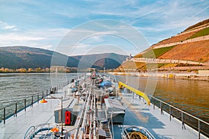 Binnenvaart, Translation Inlandshipping on the river rhein in Germany during sunset hours, Gas tanker vessel rhine river