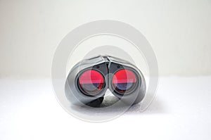 Binoculars with red night vision lens photo