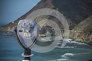 Binocular viewer at OF DISTANT VIEW OF BIG CREEK BRIDGE ON BIG SUR COASTLINE, CALIFORNIA, USA