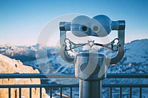 Binocular viewer with mountain landscape, Sass Pordoi view