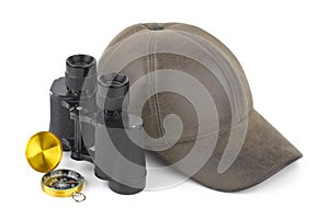 Binoculars, compass and cap