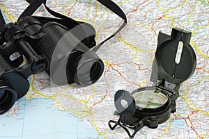 Binoculars, compass and map