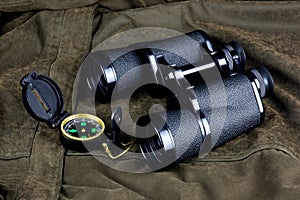 Binoculars and Compass on an Outdoor Field Coat