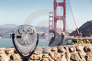 Binoculars with Golden Gate Bridge in the background, San Francisco, California
