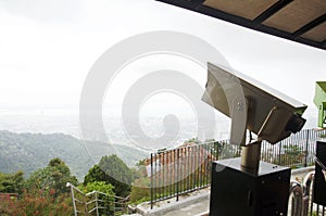 Binoculars looking penang city at bukit bendera photo