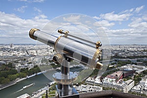 Binoculars overlooking panorama of Paris