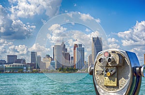 Binoculars overseeing Detroit city skyline