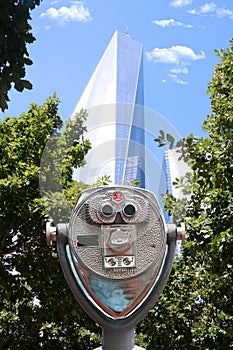 Binoculars point of view in front of One World Trade Center, Manhattan New York City