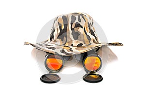 Binoculars and a safari hat