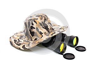 Binoculars and a safari hat