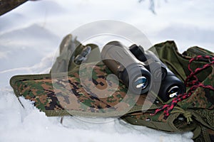 Binoculars in the snow