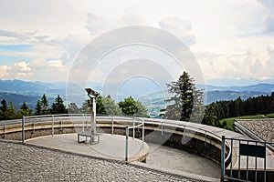 Binoculars at a viewpoint to the Alps Mountain