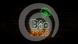 Bio food neon on brick wall