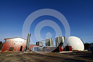 Bio gas plant against blue sky