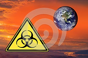 Bio-hazard sign & Earth planet on dramatic background.