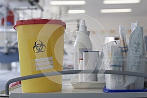 Bio medical waste box on hospital bed table in intensive care unit