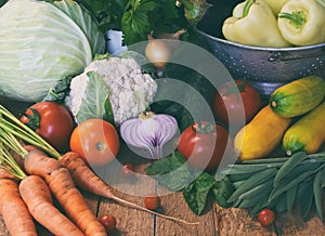 Bio organic fresh summer vegetables - first harvest of organically grown cabbage, cucumber, carrot, zucchini, pepper, onion, eggpl