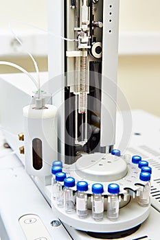 Biochemical analyzer with turret in laboratory