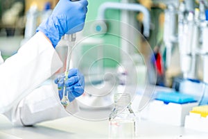 biochemical test in the laboratory. a substance in a glass test tube