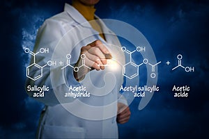 Biochemist writes the formula.