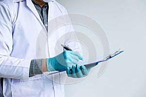 Biochemistry laboratory research, Chemist is analyzing sample an