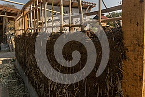 bioconstruction, earthen walls built with straw and mud