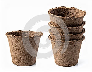 Biodegradable Brown Peat Pots Stacked on White Background Studio Shot