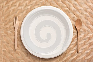 Biodegradable, Compostable or Eco friendly disposable plate with wooden spoon and fork