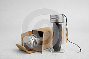 Biodegradable dental flosses on light blue background