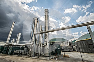 Biogas plant with dramatic sky