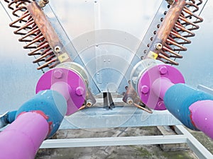 Biogas powerplant cooler.  Pink and blue pipes, flangess