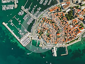 Biograd na Moru, aerial above marina view with ships and yachts at old pier in row