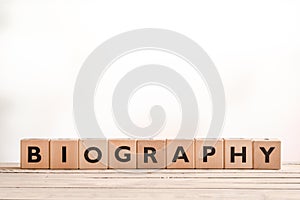 Biography headline sign on a table