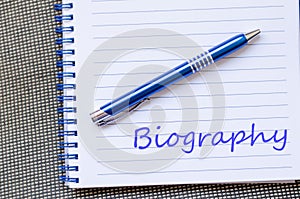 Biography write on notebook photo